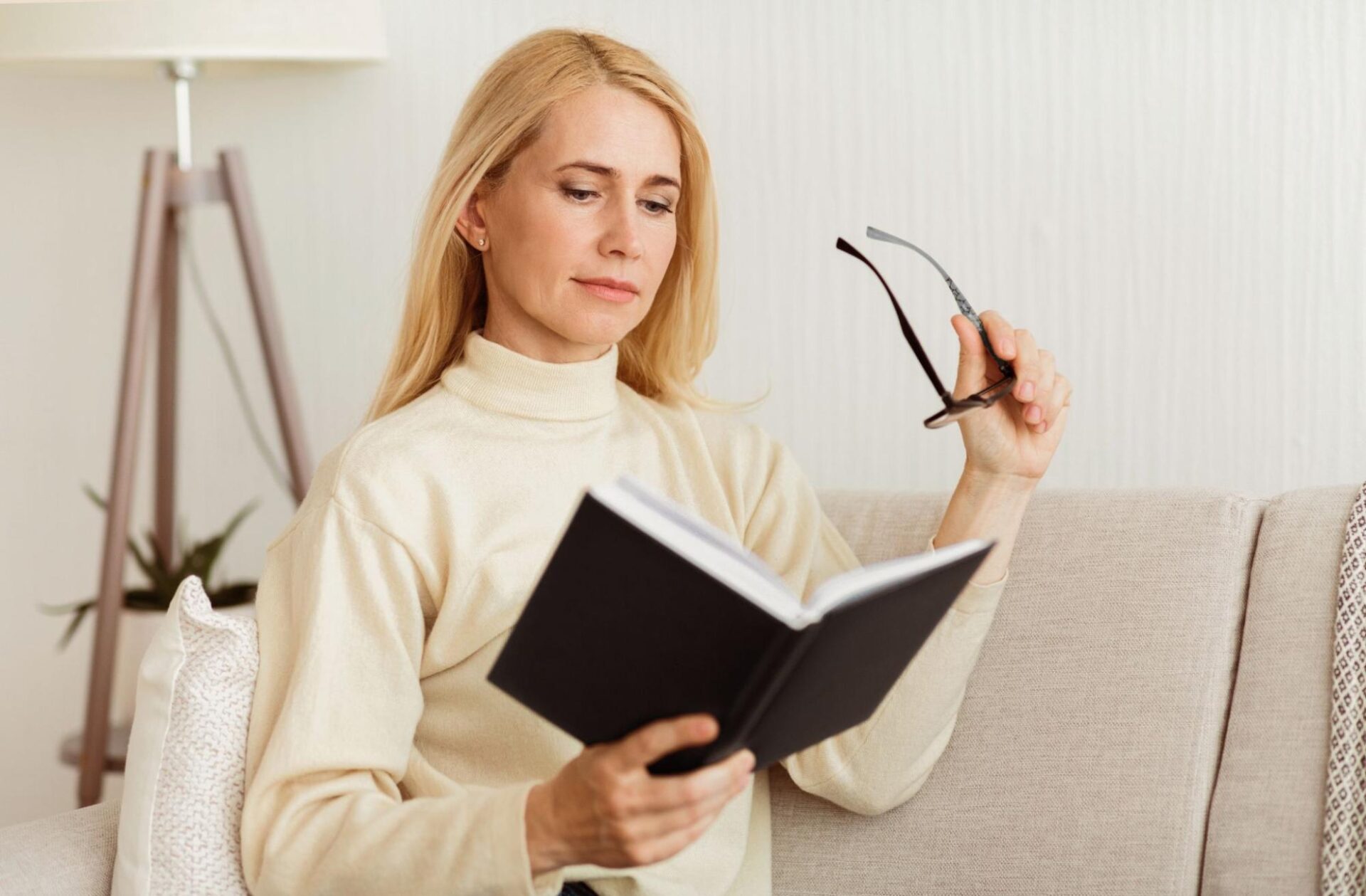 Woman experiencing presbyopia symptoms