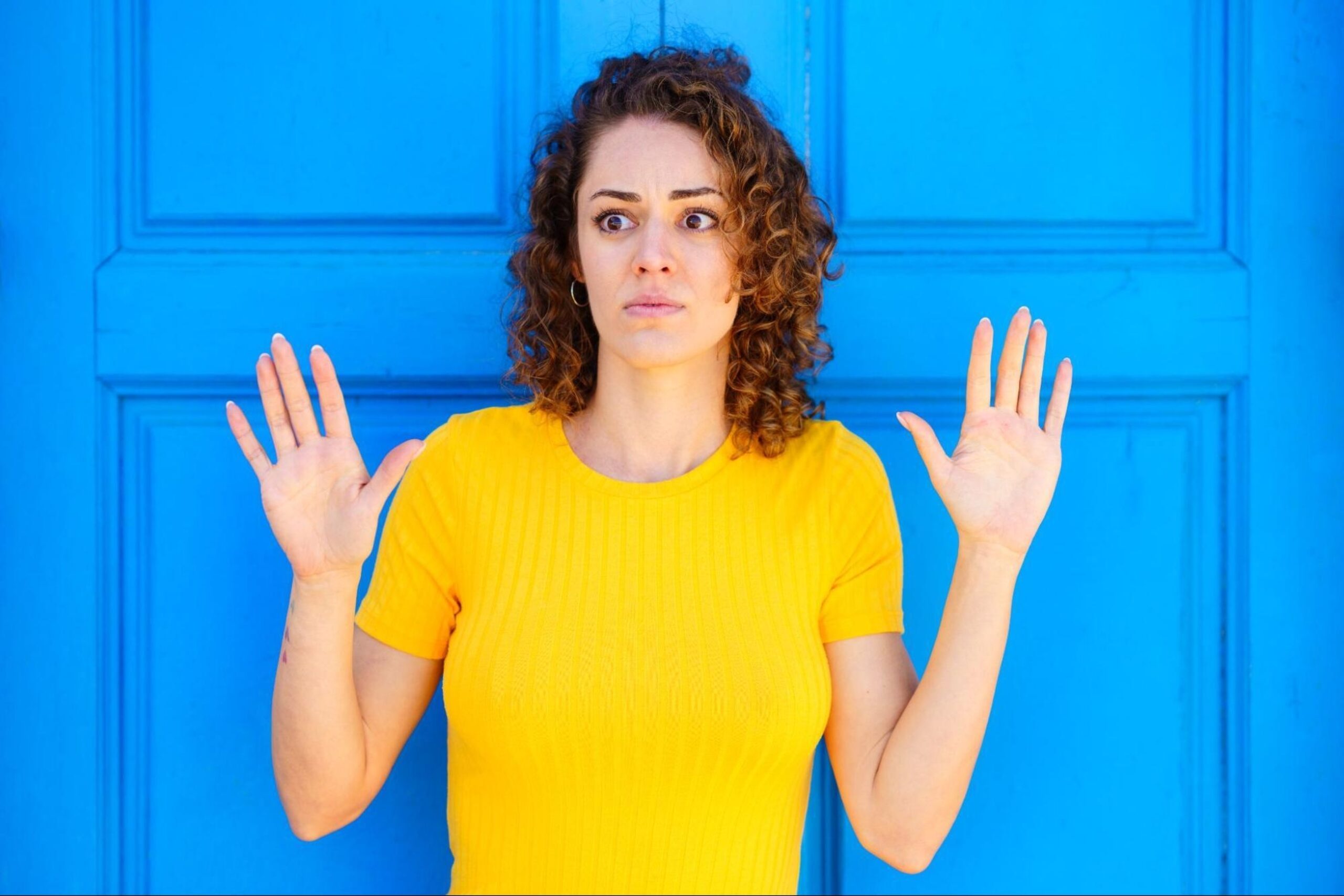 Woman thinking about a color blind test